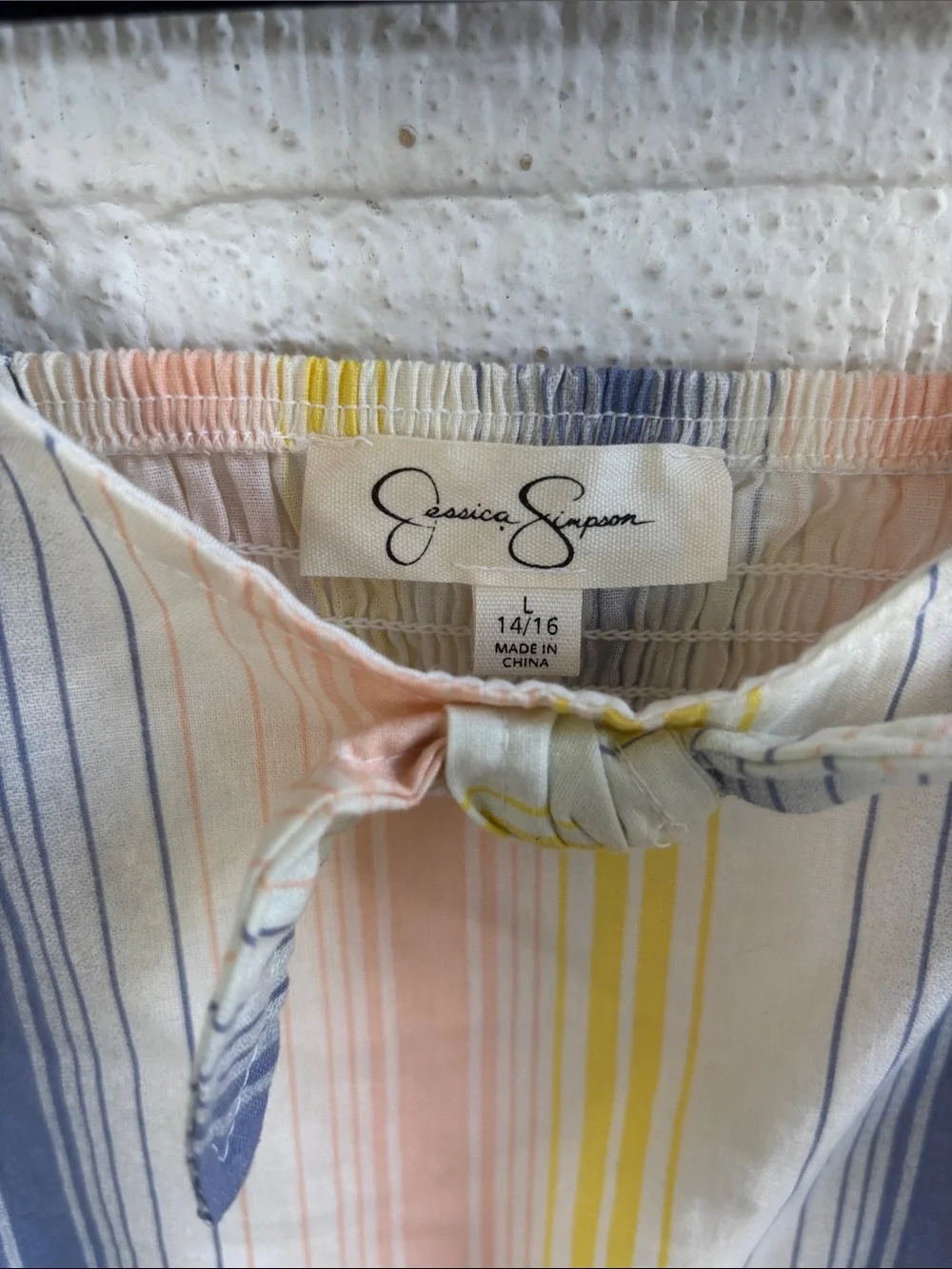 Jessica Simpson sleeveless button